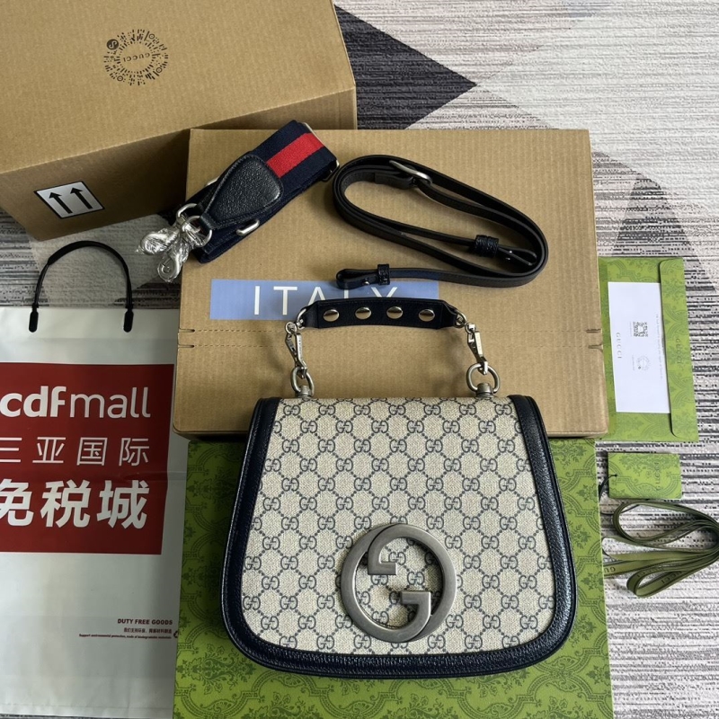 G*u*i top handle bags